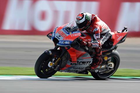 MotoGP: Lorenzo takes pole in delayed qualifying