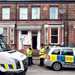Officers from two police forces raid properties