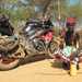 A Kenyan tribesman poses with Sanders' Yamaha R1