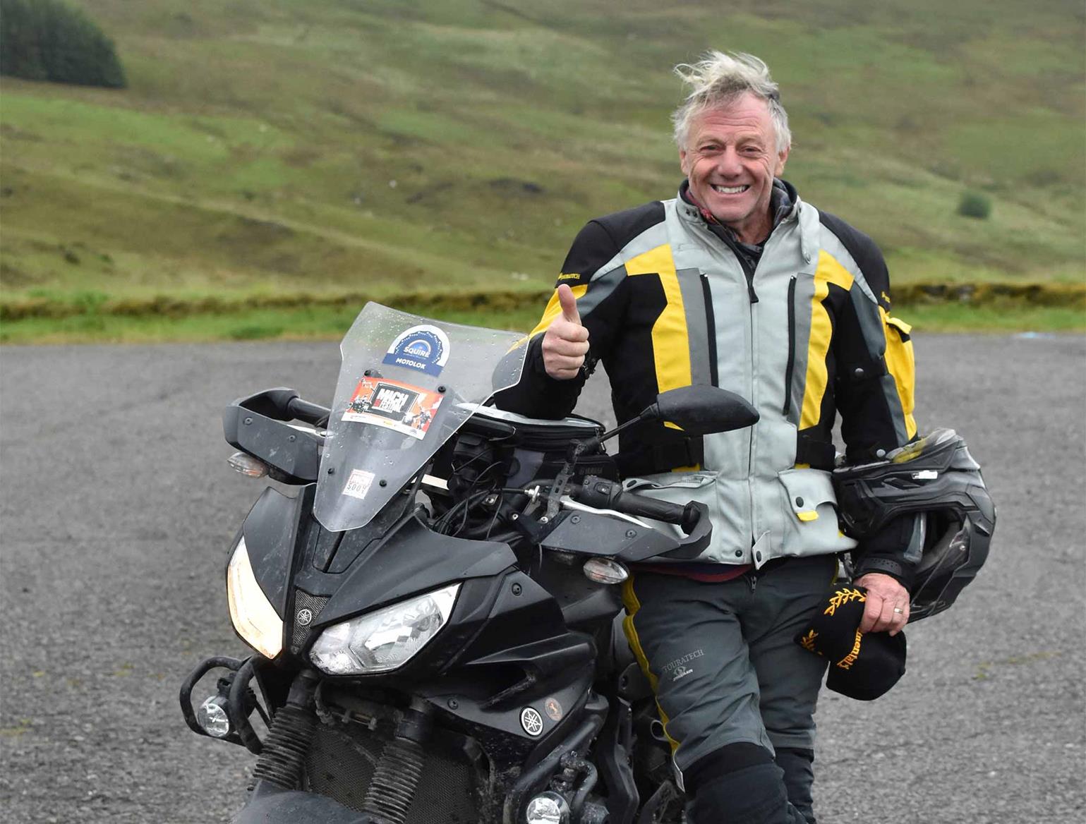 Motorcycling adventurer Nick Sanders awarded an MBE | MCN