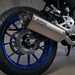 2020 Yamaha MT-125 rear wheel in blue with Akrapovic exhaust can