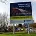A Highways England sign detailing smart motorway plans