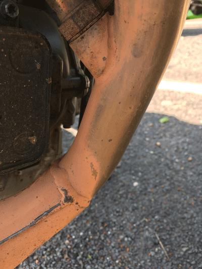 1000 miles of rain turned the the exhaust as orange as the tank 1000 miles of rain turned the the exhaust as orange as the tank