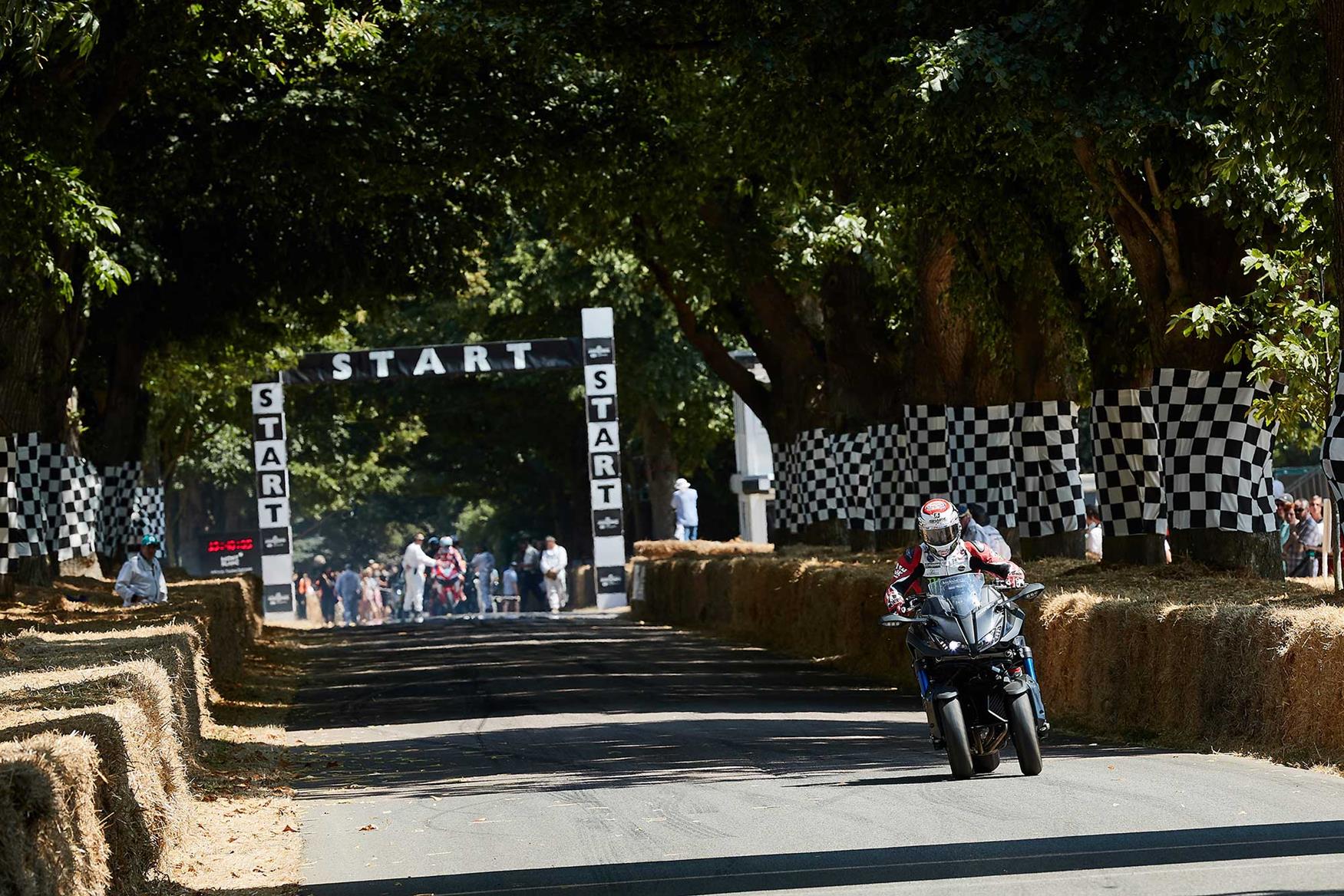 Alex Lowes rides a Yamaha Niken up the start of the famous Goodwood hill-climb Alex Lowes rides a Yamaha Niken up the start of the famous Goodwood hill-climb