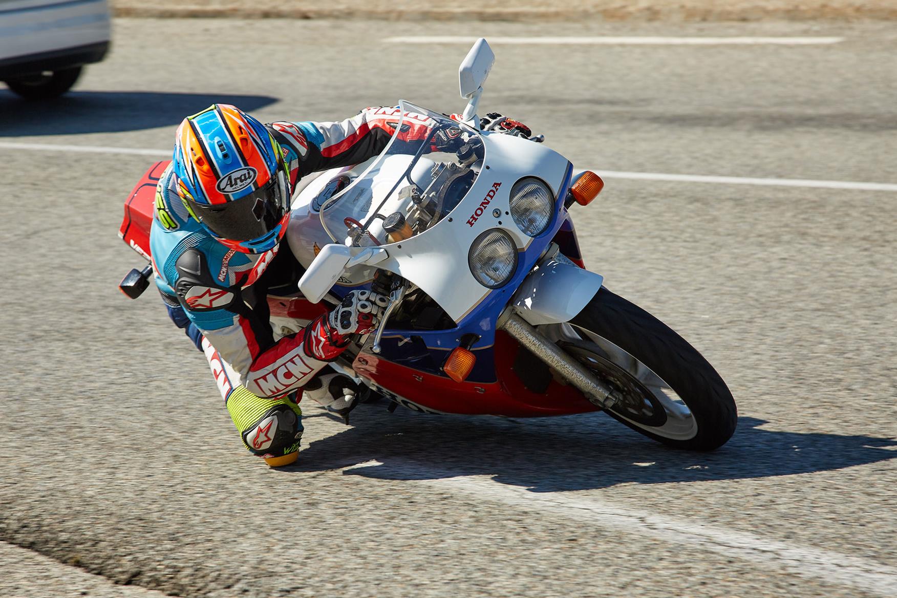 Chief Road Tester Michael Neeves testing a Honda RC30 Chief Road Tester Michael Neeves testing a Honda RC30