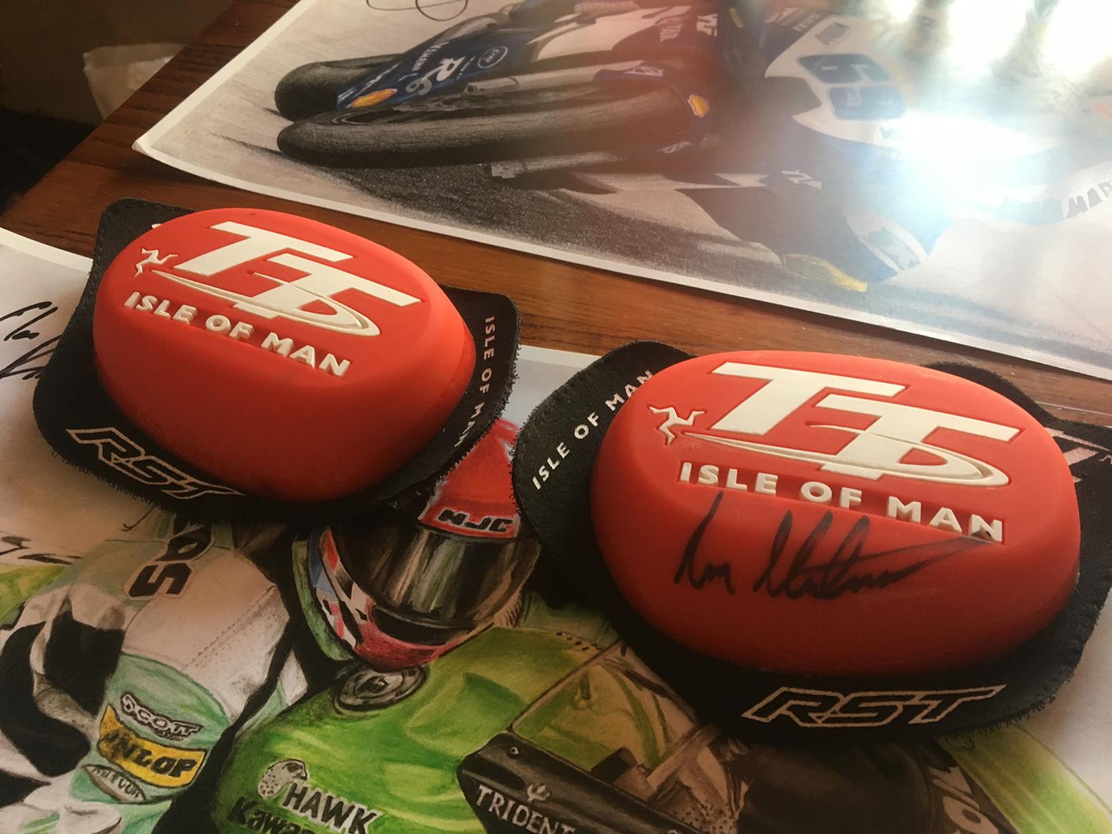 A set of signed knee sliders A set of signed knee sliders