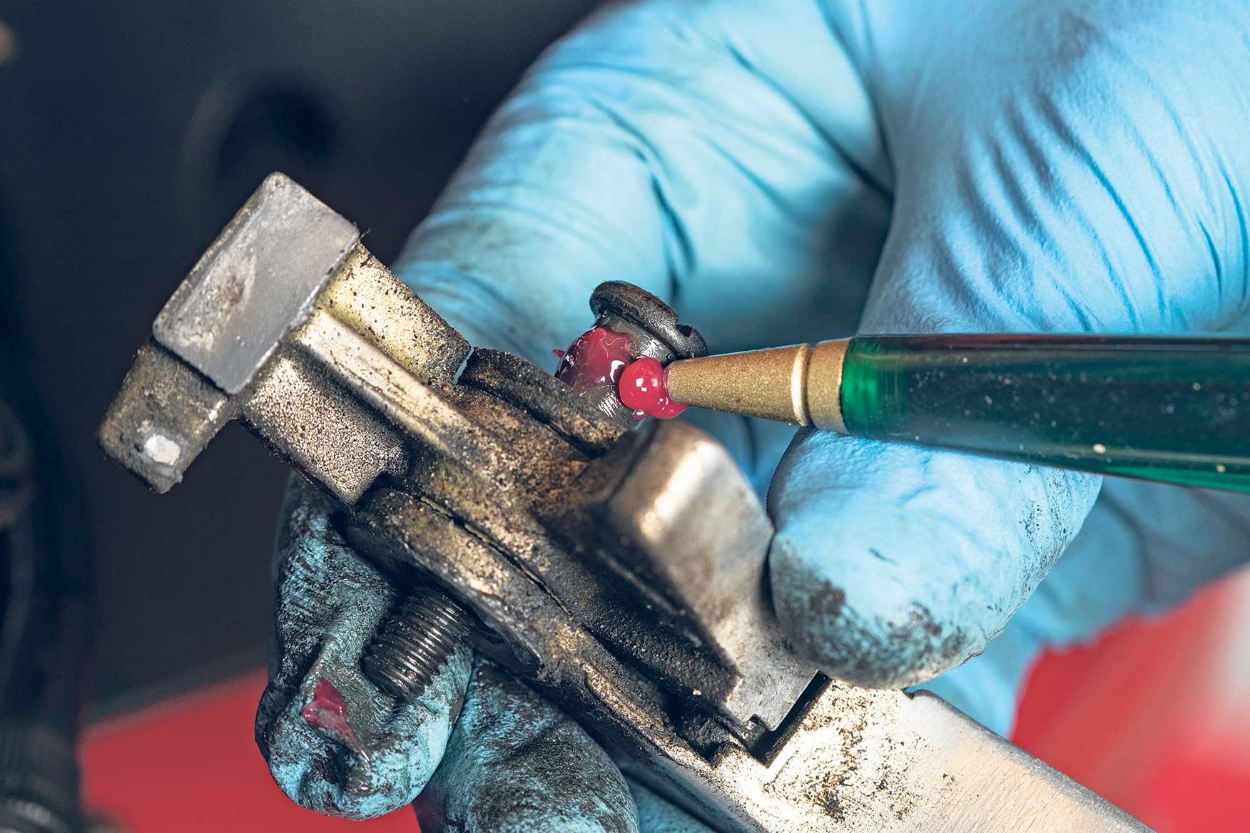 Remove front brake and give the pivot bolt a thorough clean Remove front brake and give the pivot bolt a thorough clean