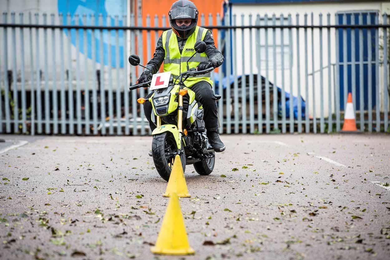 MCN's Dan Sutherland slaloms on the Honda MSX125 MCN's Dan Sutherland slaloms on the Honda MSX125