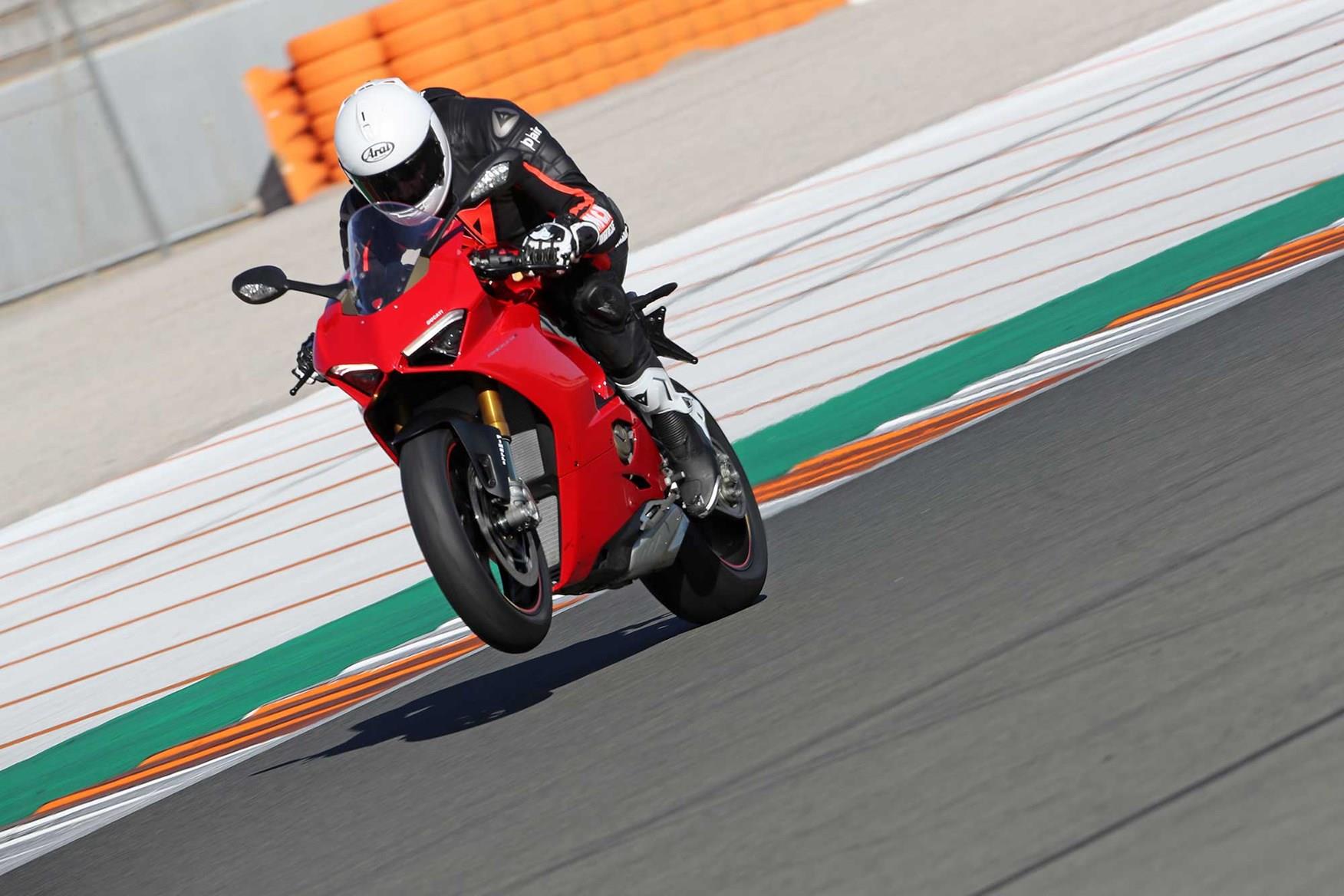 Former Senior Editor Matt Wildee power wheelies the Panigale V4S Former Senior Editor Matt Wildee power wheelies the Panigale V4S