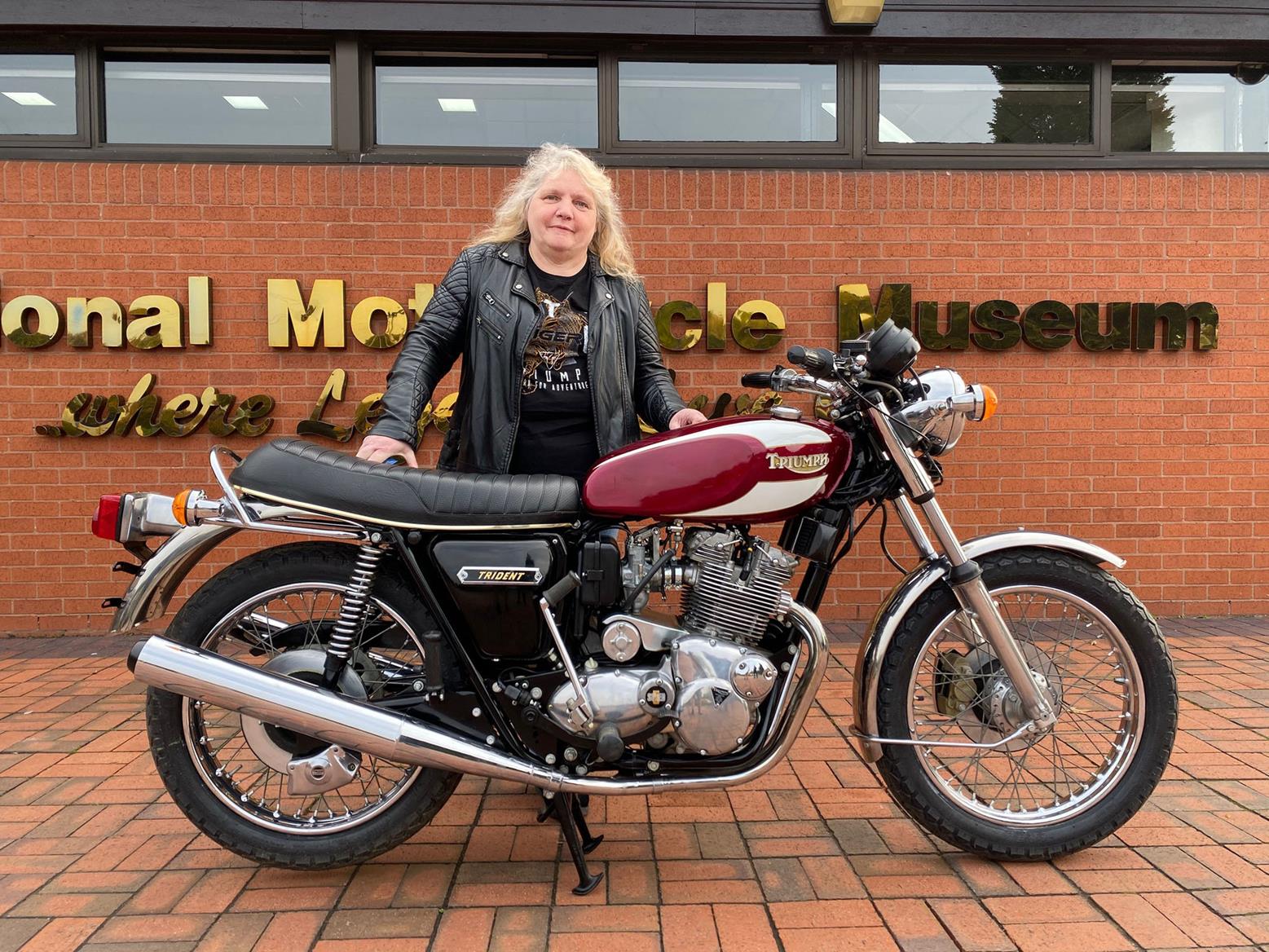 Mrs Sally Peace collects her Triumph Trident raffle prize Mrs Sally Peace collects her Triumph Trident raffle prize