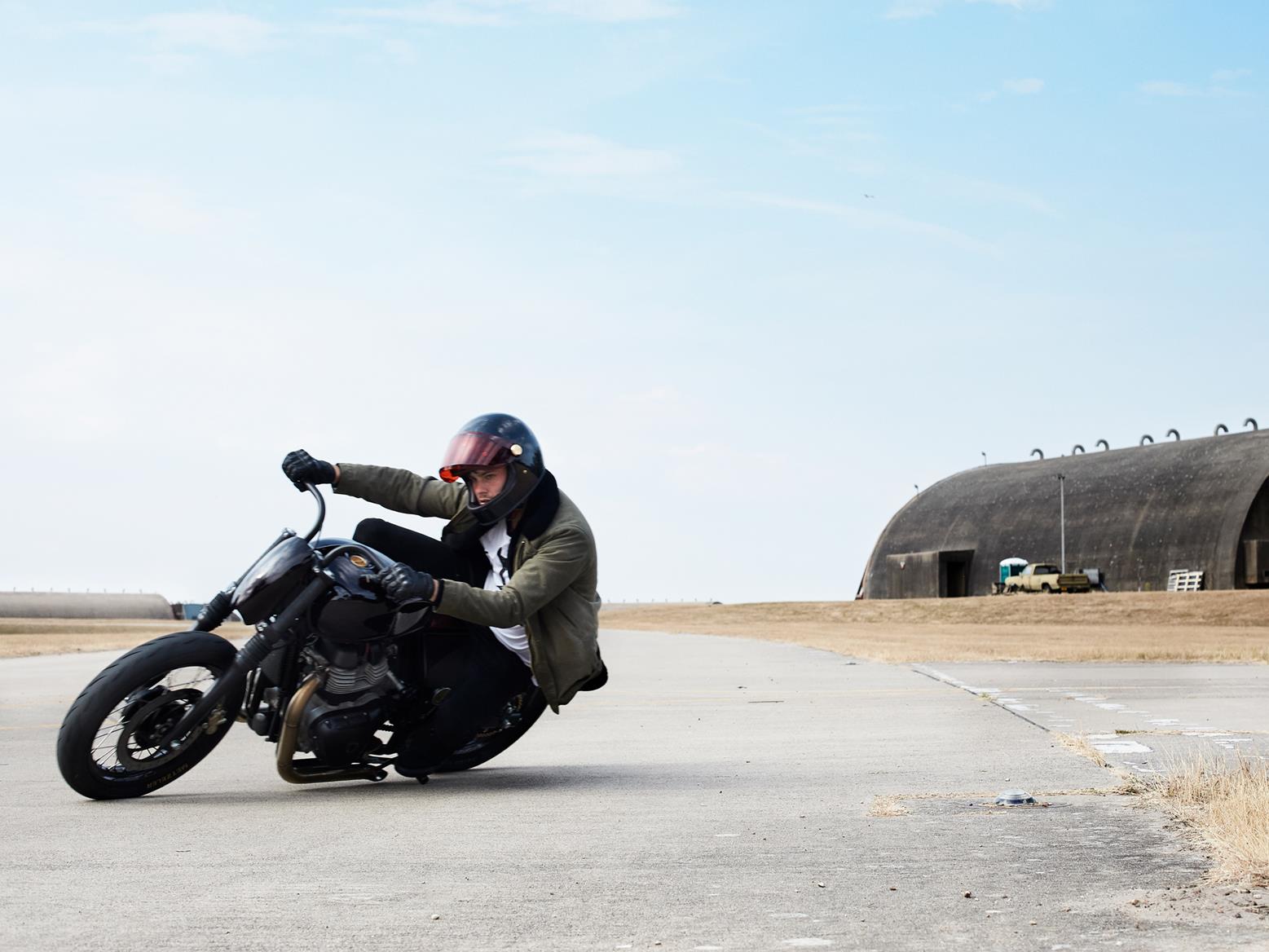 Old Empire Motorcycles custom Royal Enfield Interceptor 650 twin cornering shot Old Empire Motorcycles custom Royal Enfield Interceptor 650 twin cornering shot
