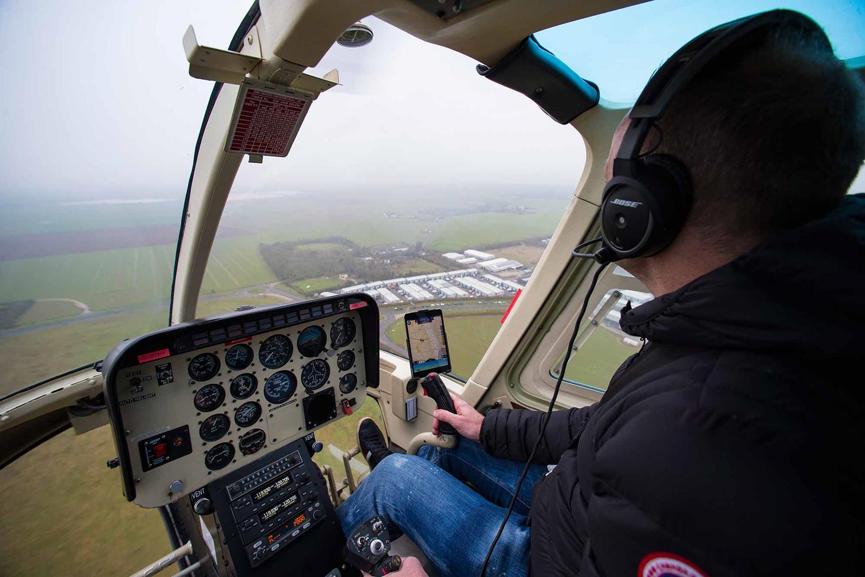 Byrne pilots a helicopter Byrne pilots a helicopter