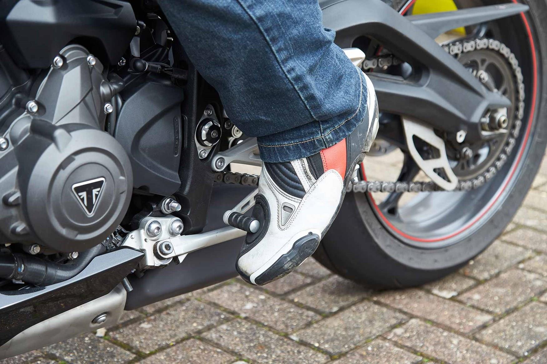 You change gears with your foot on most motorbikes You change gears with your foot on most motorbikes