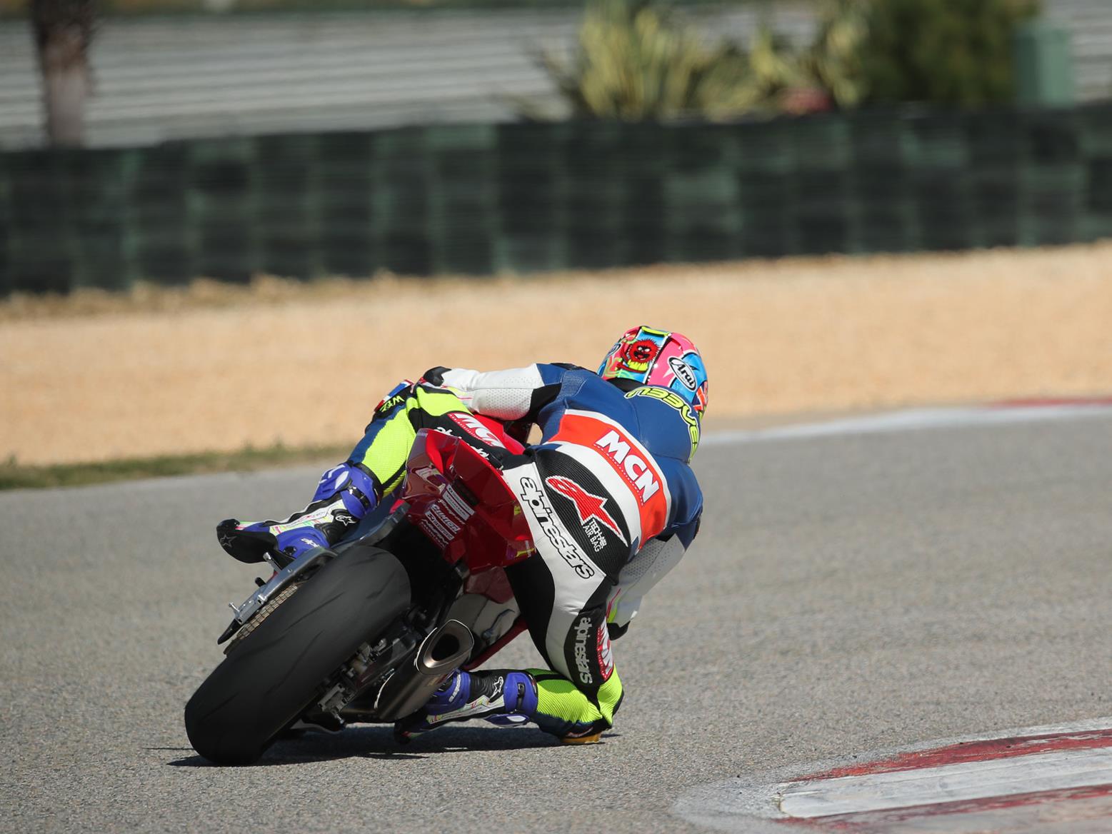 Honda Fireblade SP2 rear end, with Michael Neeves and his knee down Honda Fireblade SP2 rear end, with Michael Neeves and his knee down