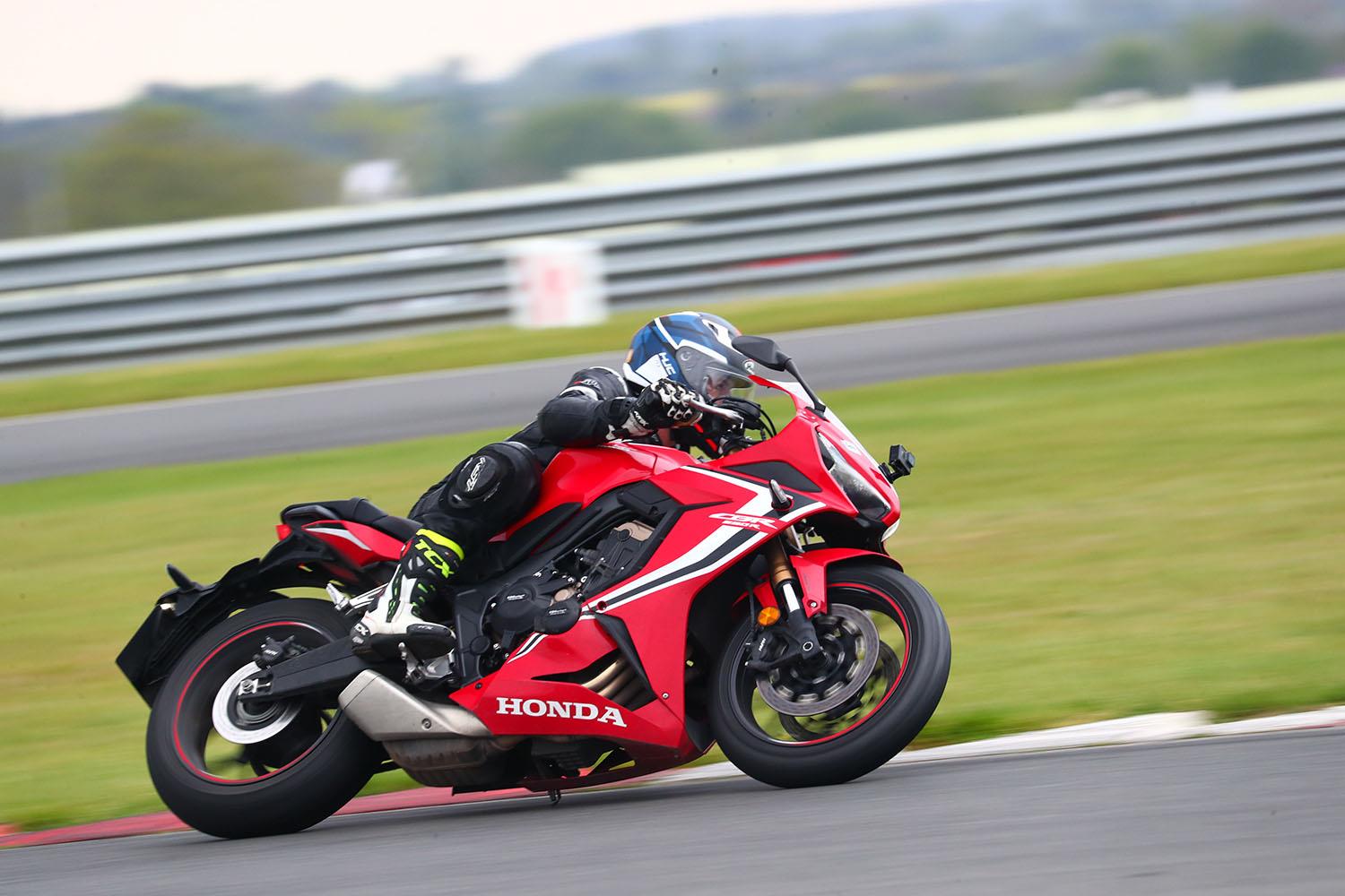 Honda CBR650R cornering left Honda CBR650R cornering left