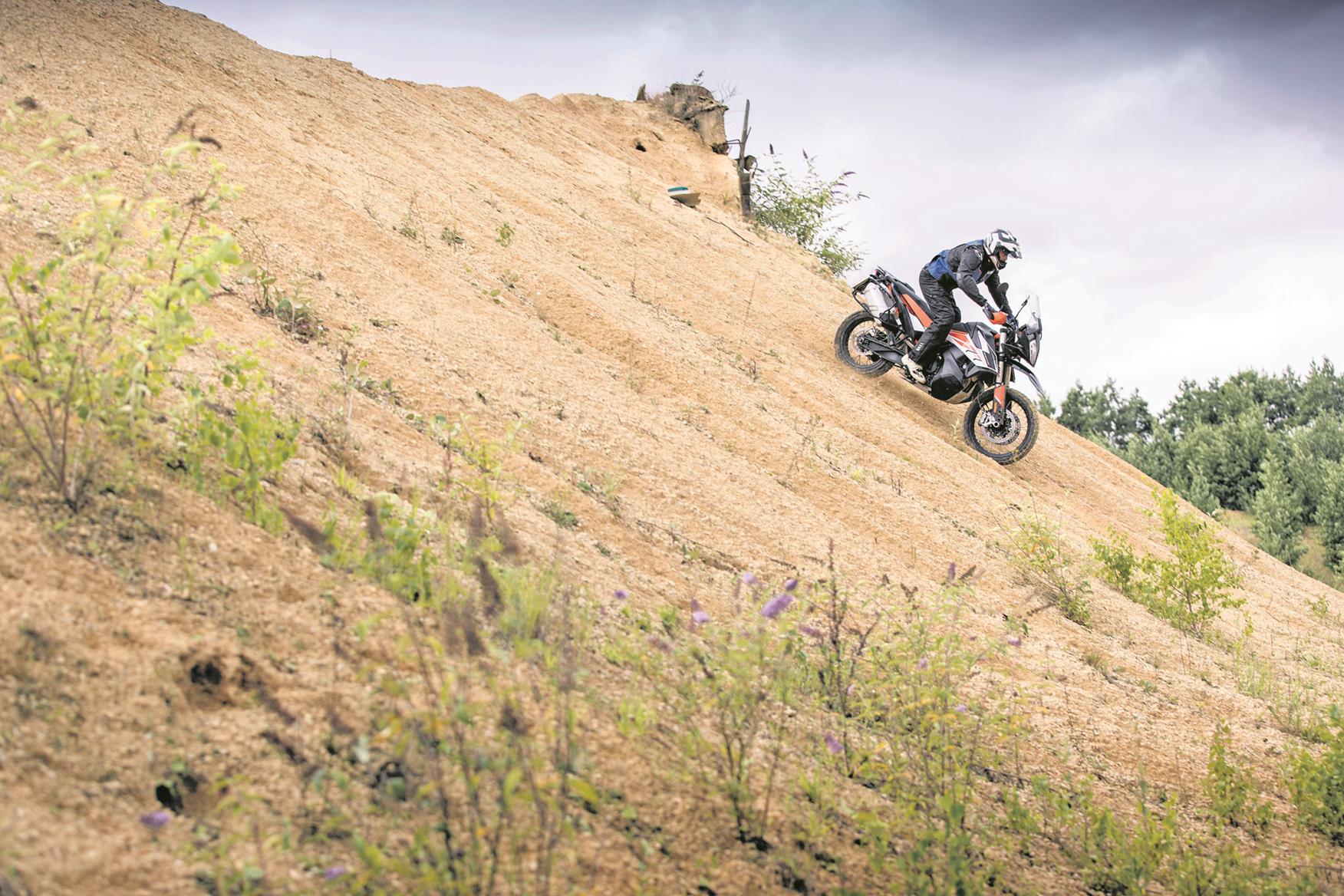 Heading down hill off-road aboard the KTM 790 Adventure R Heading down hill off-road aboard the KTM 790 Adventure R