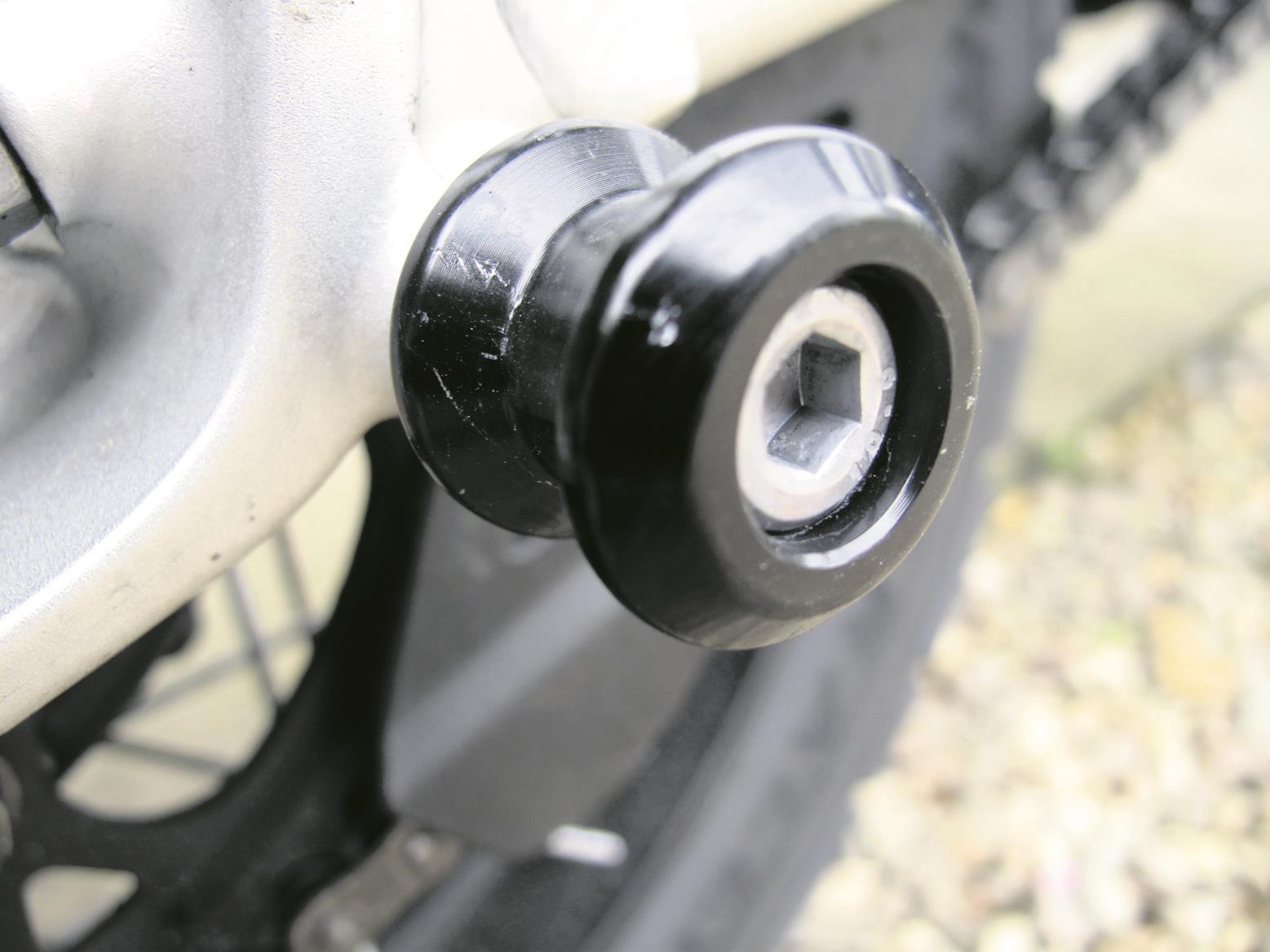 Paddock stand bobbins makes chain adjustment easier Paddock stand bobbins makes chain adjustment easier