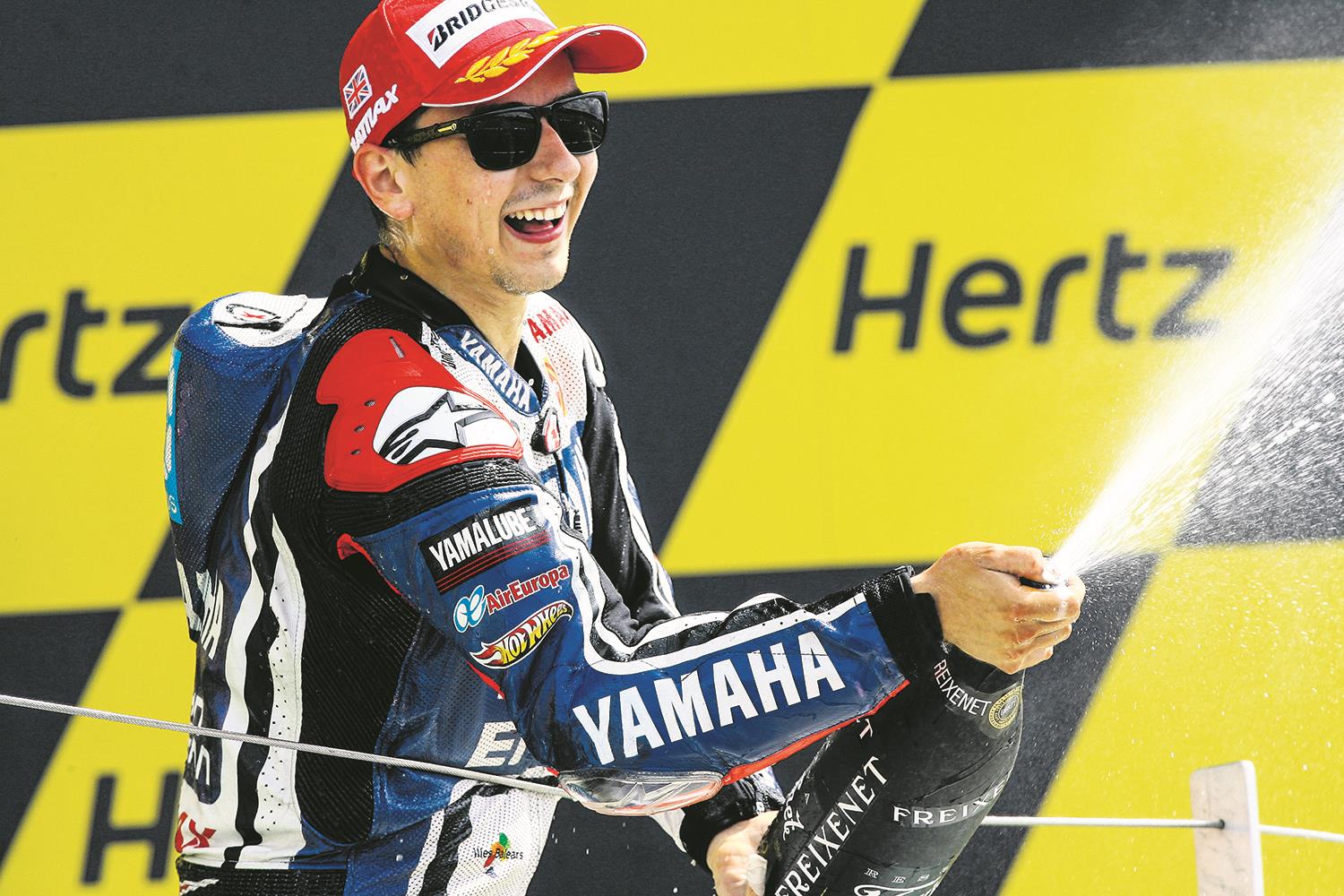 Jorge Lorenzo on the podium at the 2012 Silverstone MotoGP Jorge Lorenzo on the podium at the 2012 Silverstone MotoGP