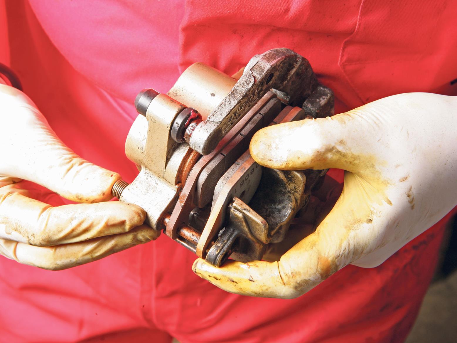 A knock when braking could be a caliper or suspension problem A knock when braking could be a caliper or suspension problem