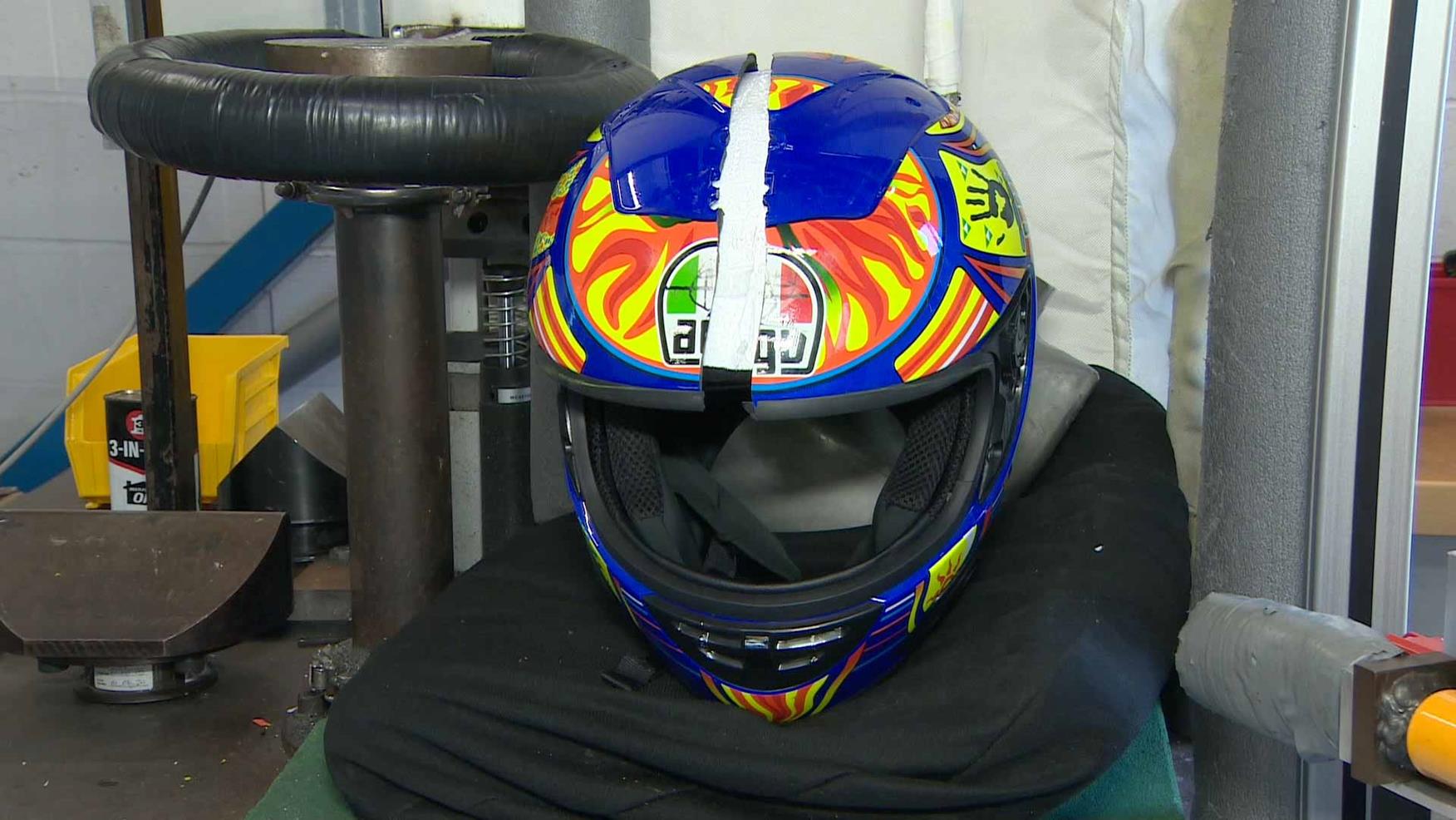 A fake helmet splits under testing A fake helmet splits under testing