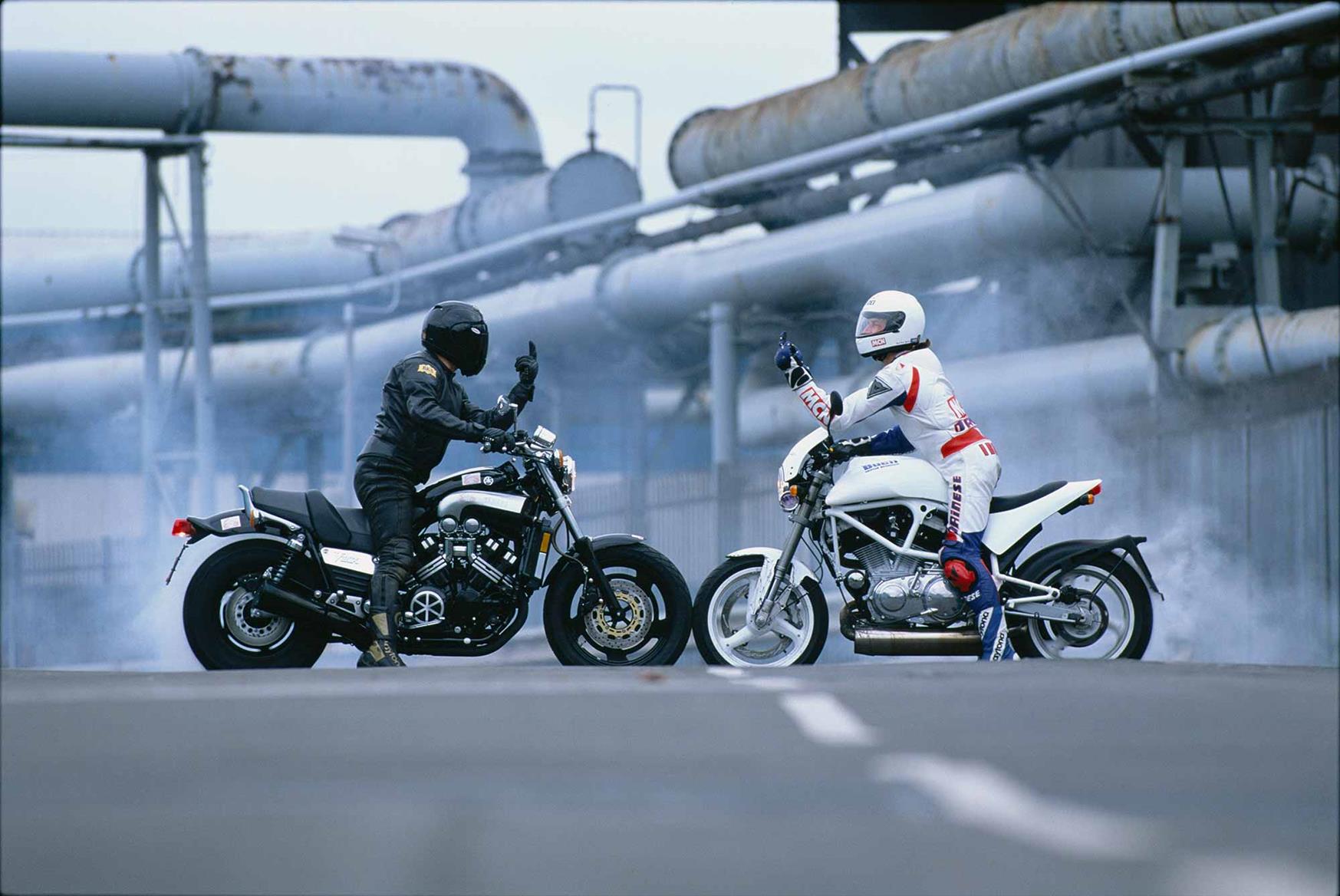 A Yamaha V-Max pulls a burnout with the Buell S1 White Lightning A Yamaha V-Max pulls a burnout with the Buell S1 White Lightning