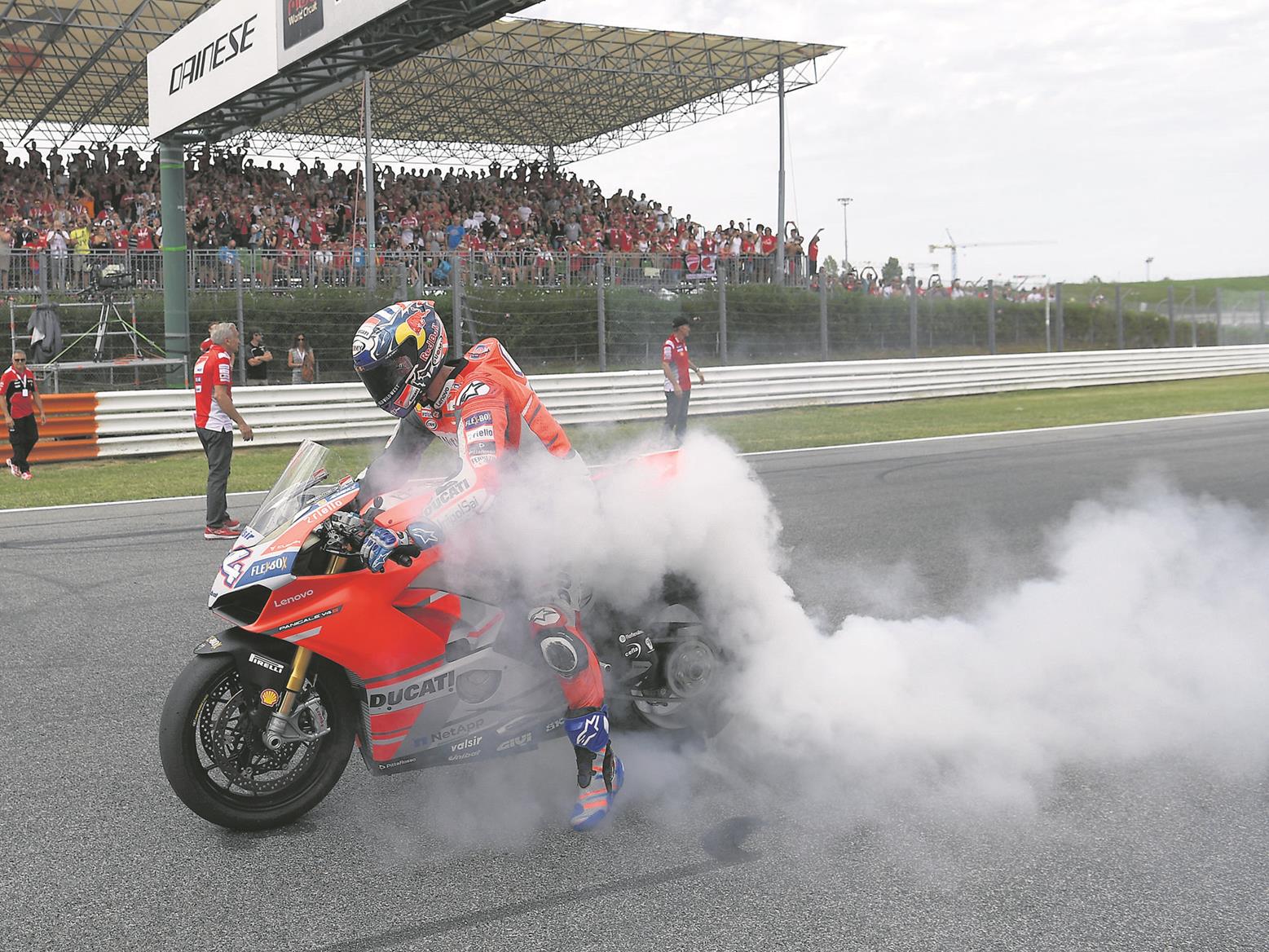 Andrea Dovizioso performs a burnout Andrea Dovizioso performs a burnout