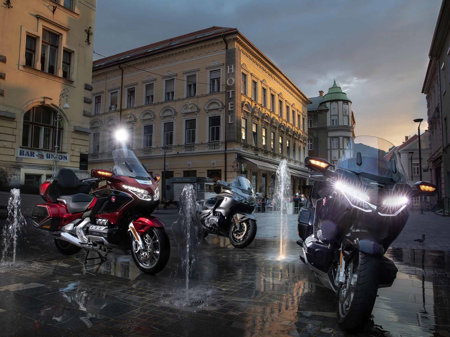 Honda GL1800 Gold Wing DCT parked by a fountain Honda GL1800 Gold Wing DCT parked by a fountain