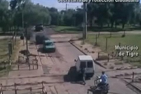 Video: Heroic pillion rider risks life to prevent train crash