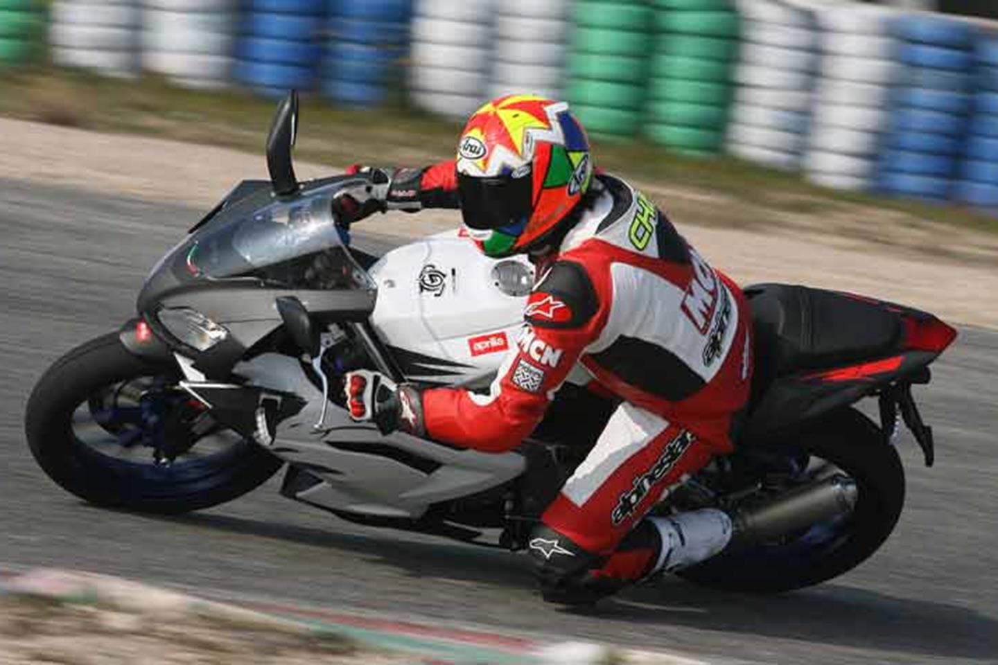 Aprilia RS125 ridden on track with knee down. What a great 125