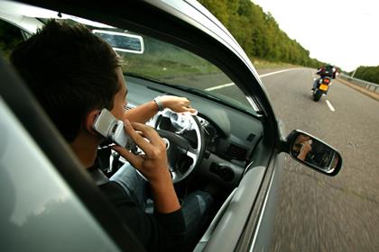 Even a driving instrcutor was caught on a mobile phone