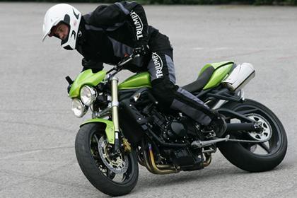 Kevin Carmichael performed stunts at the new Triumph Street Triple launch