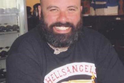 Gerard Michael Tobin, 35, was shot dead riding his Harley-Davidson FXSTB Night Train motorcycle