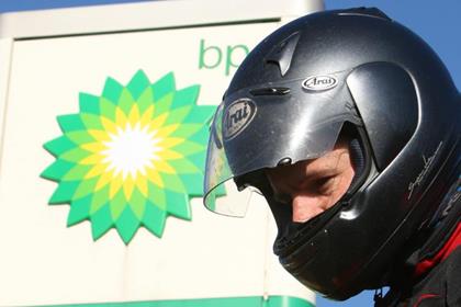 BP have lifted their ban on wearing motorcycle helmets at their petrol stations