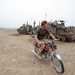 Prince Harry has always been a fan of motorcycles. Pictured here on a CG125 his company found abandoned while on tour in Afghanistan. Photo: John Stillwell/PA Wire 