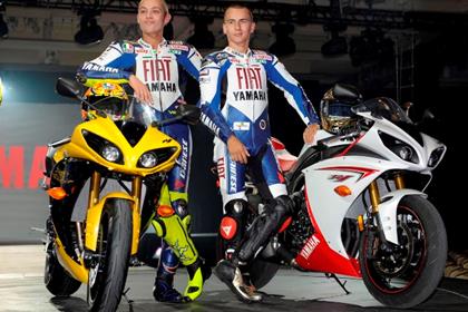 Fiat Yamaha team-mates, Valentino Rossi and Jorge Lorenzo, on stage