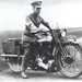 Lawrence in the saddle, onboard a Services despatch rider's bike