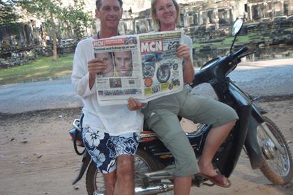 My girlfriend and I with our copy of MCN outside the Bayon temple in Siem Reap Cambodia