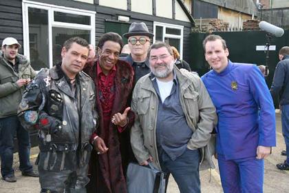 Left to right: Dave Lister (Craig Charles), the Cat (Danny John Jules), Kryten (Robert Llewellyn), the bus driver (Julian Ryder) and Arnold Rimmer (Chris Barrie)