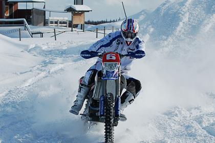 BMW G450X takes on snowmobile