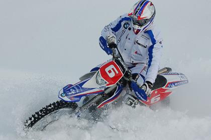 BMW G450X takes on snowmobile