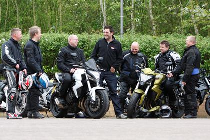 Keith, Des, Jamie, Russle, Alex and Anthony share a joke with MCN editor Marc Potter