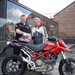 Carl Fogarty picks up his Ducati Hypermotard S