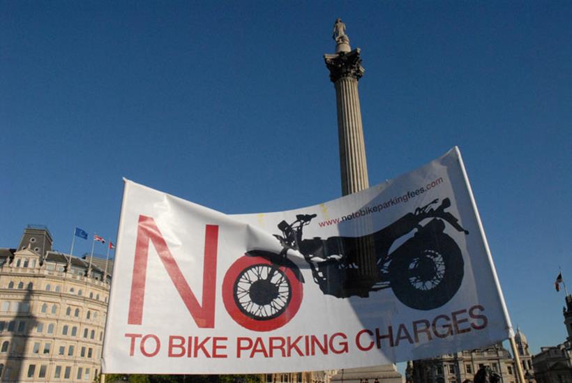 Banner from a previous motorcycle parking charges protest