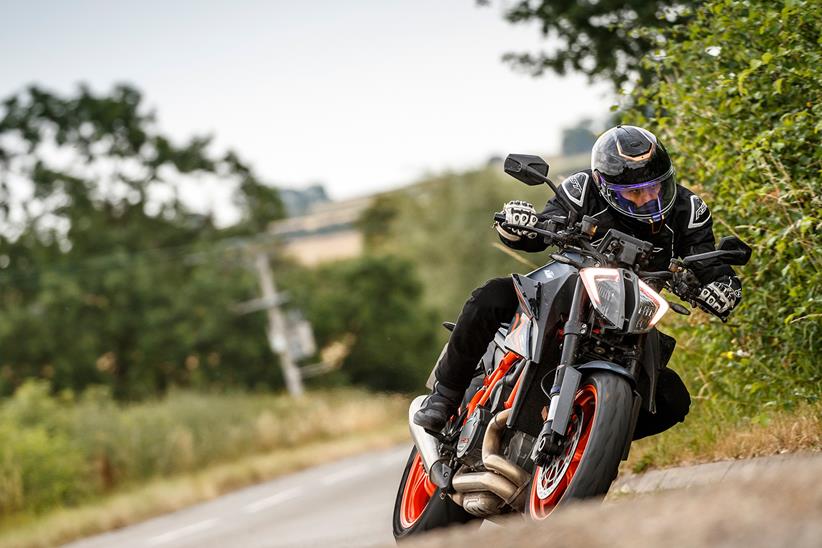 Cornering on the KTM 1290 Super Duke R Evo on a UK country road