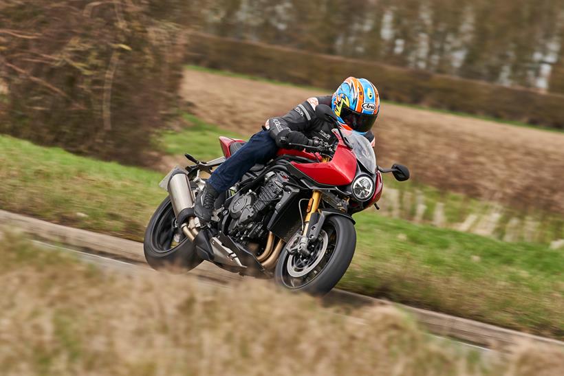 Riding shot of the Triumph Speed Triple RR