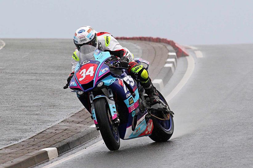 Alastair Seeley deals with a huge slide in the Superstock race