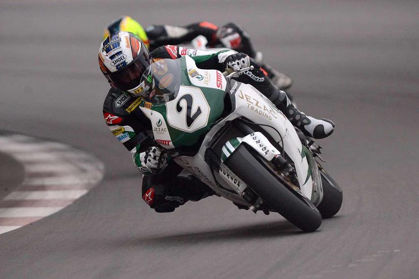 John McGuinness onboard his SMT Racing machine at the 2012 Macau Grand Prix