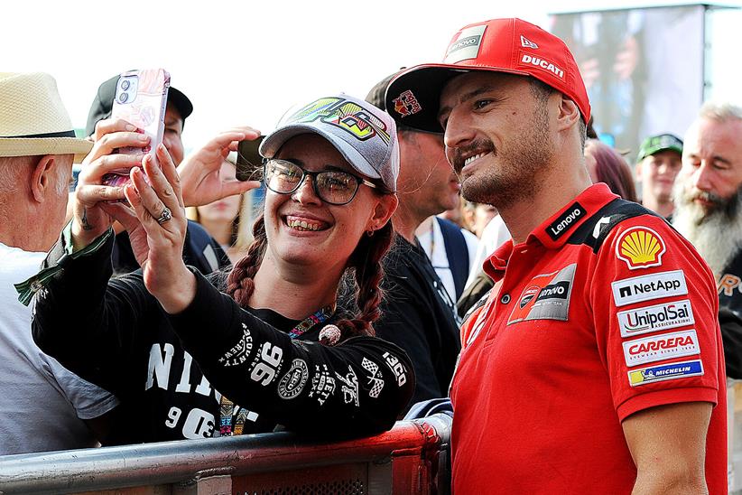 Jack Miller poses for a selfie with a fan