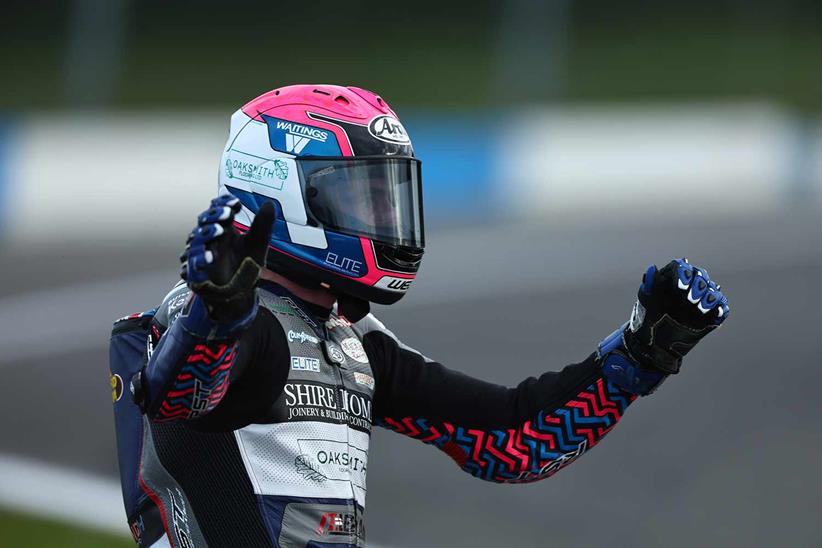 Bradley Perie celebrates his Supersport victory at Donington