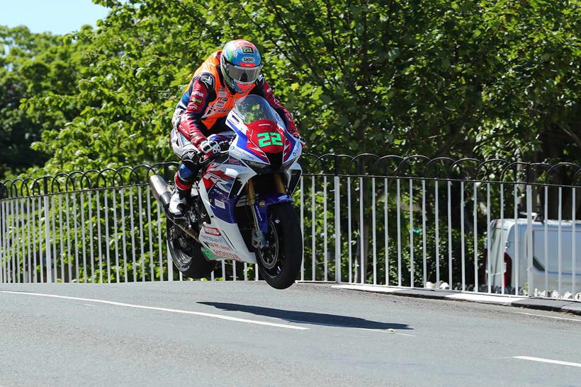 Newcomer Glenn Irwin gets to grips with Ballaugh Bridge on his Superstock Honda